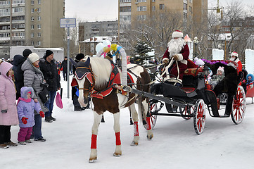 Image showing Festive drivings in the carriage with Father Frost