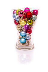 Image showing Christmas baubles with lights in a vase