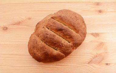 Image showing Freshly baked loaf of multi seed malted bread 