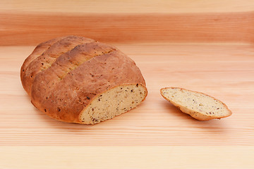 Image showing Fresh malted bread loaf with the crust cut off