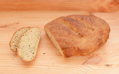 Image showing Two slices of bread cut from a fresh loaf 