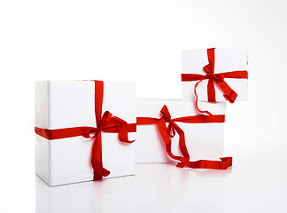 Image showing white gift box with nice ribbon
