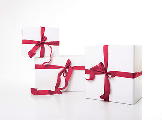 Image showing white gift box with nice ribbon