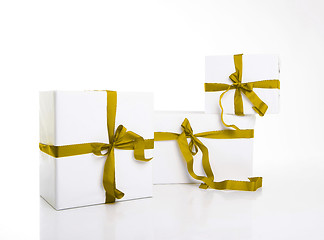 Image showing white gift box with nice ribbon