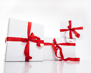 Image showing white gift box with nice ribbon