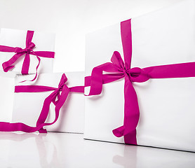 Image showing white gift box with nice ribbon