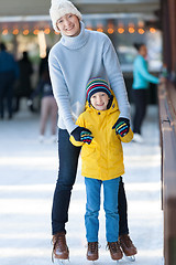 Image showing family ice skating