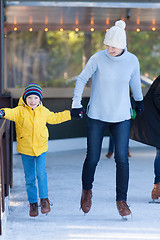 Image showing family ice skating