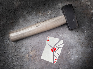 Image showing Hammer with a broken card, ace of hearts