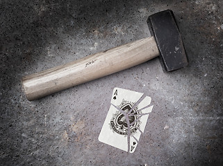 Image showing Hammer with a broken card, ace of spades