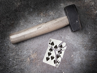 Image showing Hammer with a broken card, ten of spades