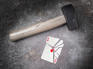 Image showing Hammer with a broken card, ace of diamonds