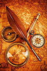 Image showing Vintage still life. Vintage items on ancient map.