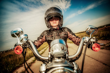 Image showing Biker girl on a motorcycle