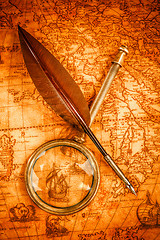 Image showing Vintage still life. Vintage items on ancient map.