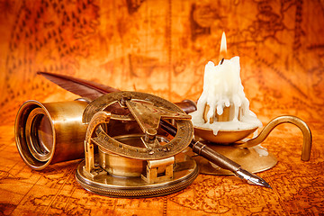 Image showing Vintage still life. Vintage items on ancient map.