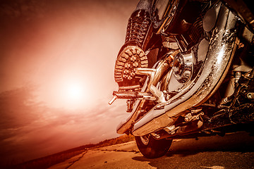 Image showing Biker girl riding on a motorcycle