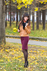 Image showing Slim pretty girl in an autumn forest