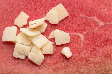 Image showing cheese on a background of meat