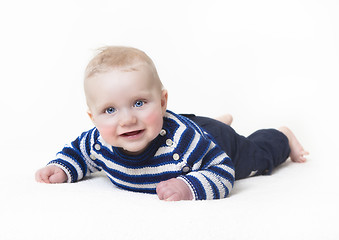 Image showing baby lying looking at camera