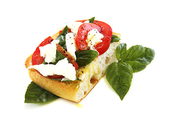 Image showing Ciabatta with tomato and cheese.