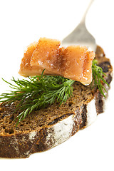 Image showing Slice of herring and black bread.