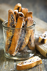 Image showing Biscotti with chocolate in a glass jar.