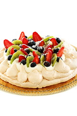 Image showing Pavlova dessert with berries and kiwi.