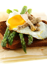 Image showing Asparagus, egg and turkey on rye bread.