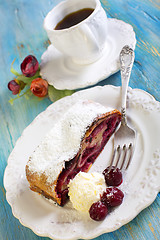 Image showing Cherry strudel and coffee.