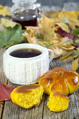 Image showing Tea with pumpkin buns.