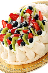 Image showing Meringue with whipped cream and berries.