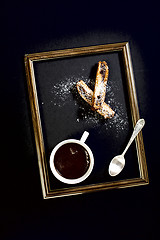 Image showing Coffee, biscotti and a teaspoon.
