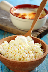 Image showing Cheese and sour cream in a wooden bowl.