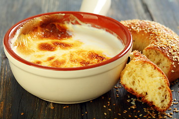 Image showing Homemade fermented baked milk and bagel.