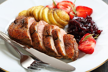 Image showing Duck breast with a sauce of red onion.