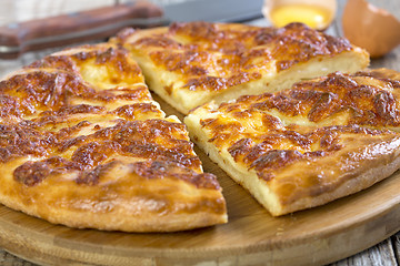 Image showing Slices of pie with cheese closeup. 