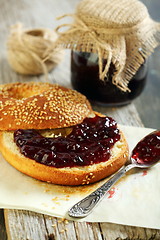 Image showing Homemade bagel with jam for breakfast.