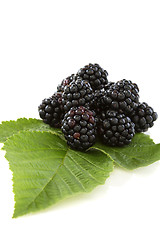 Image showing Blackberry fruit with leafs.