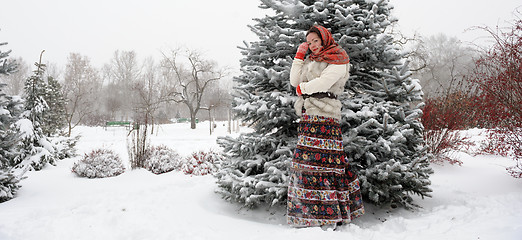 Image showing Young Russian woman in winter park