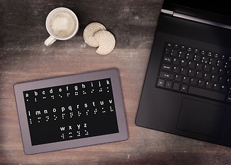 Image showing Braille on a tablet, concept of impossibility