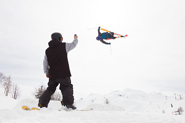 Image showing Free style skier performing a high jump