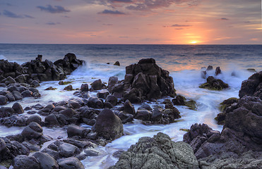 Image showing Sunrise and Minamurra volcanic rocks at low tide