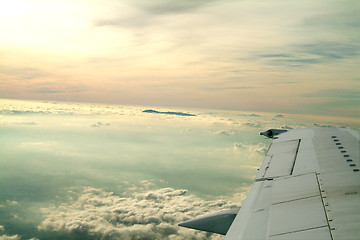 Image showing wing of an airplane and sky