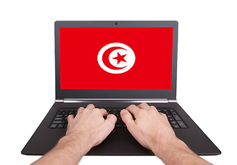 Image showing Hands working on laptop, Tunisia