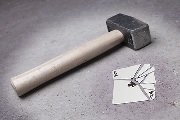 Image showing Hammer with a broken card, ace of clubs