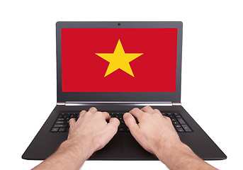 Image showing Hands working on laptop, Vietnam
