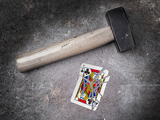 Image showing Hammer with a broken card, jack of clubs