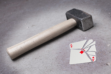 Image showing Hammer with a broken card, ace of diamonds