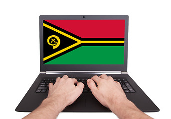 Image showing Hands working on laptop, Vanuatu